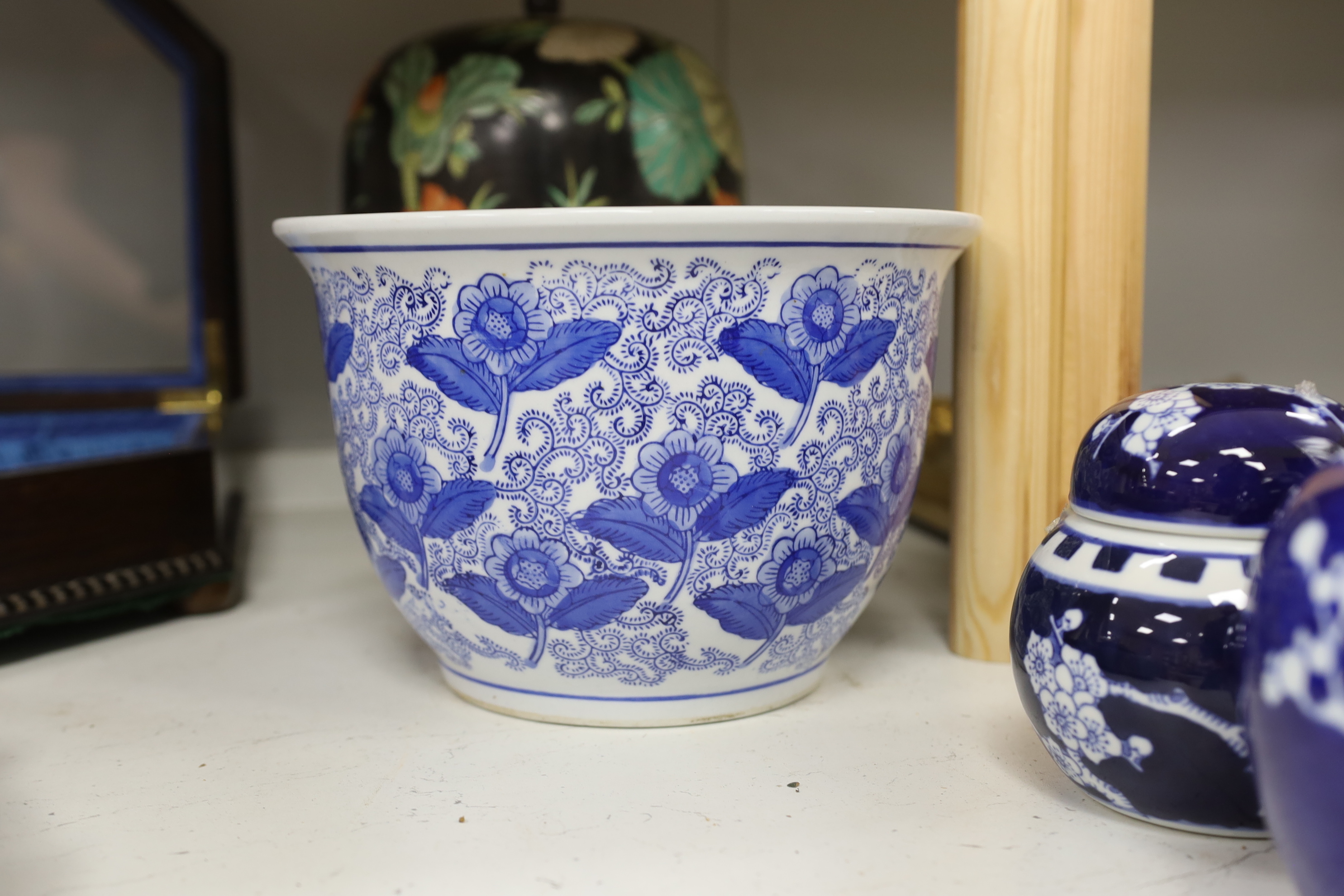 A Chinese famille noire vase and cover, three ginger jars and a jardiniere, largest 33cm